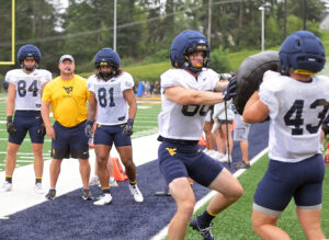 Rich Rodriguez, Travis Trickett emphasize downfield blocking in WVU's first day with shoulder pads